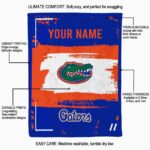 personalized florida gators paint strokes blue white blanket best selling
