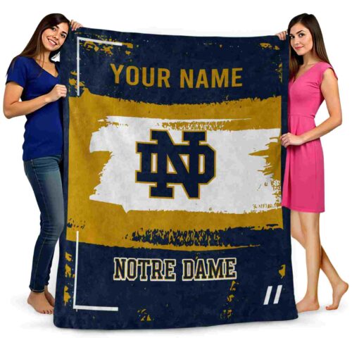 personalized notre dame fighting irish paint strokes navy white blanket fashion forward
