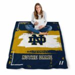 personalized notre dame fighting irish paint strokes navy white blanket best selling