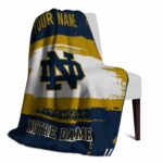 personalized notre dame fighting irish paint strokes navy white blanket best selling