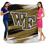 wake forest demon deacons paint streaks gold white blanket best selling