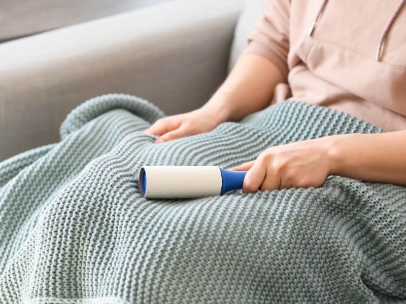 Quickly tackle shedding with a lint roller for a cleaner blanket