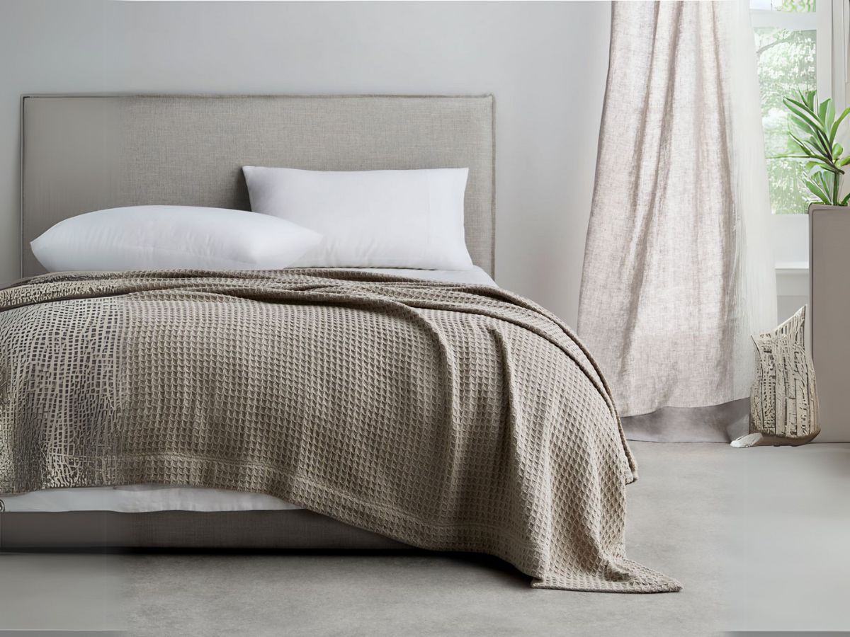 Waffle blanket holds warmth with three-dimensional texture