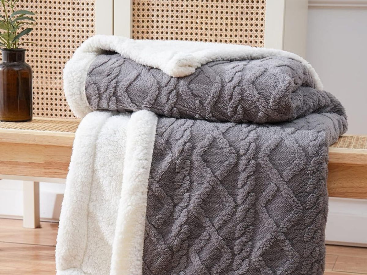 A sherpa blanket is made from polyester