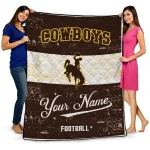 customized wyoming cowboys hibiscus burst brown white quilt blanket best selling