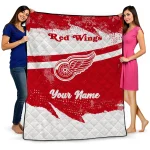 personalized detroit red wings brushstroke layers red quilt blanket best selling